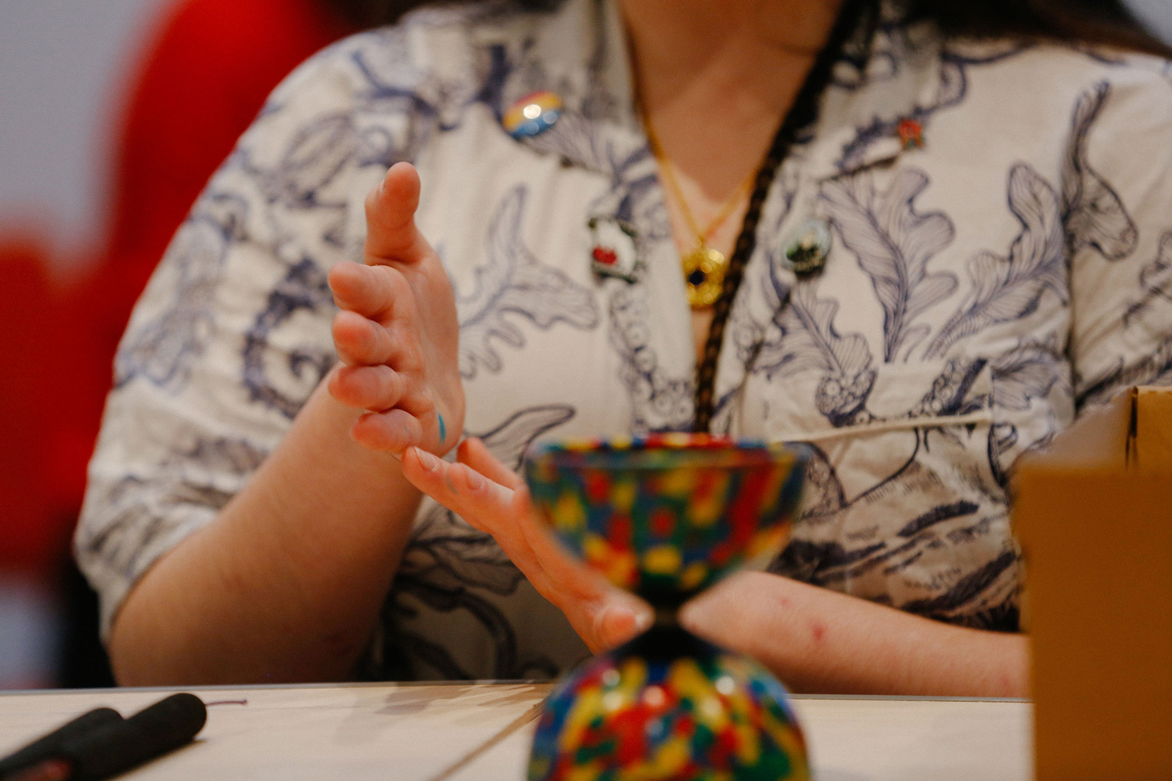 A person's hands behind a diabolo