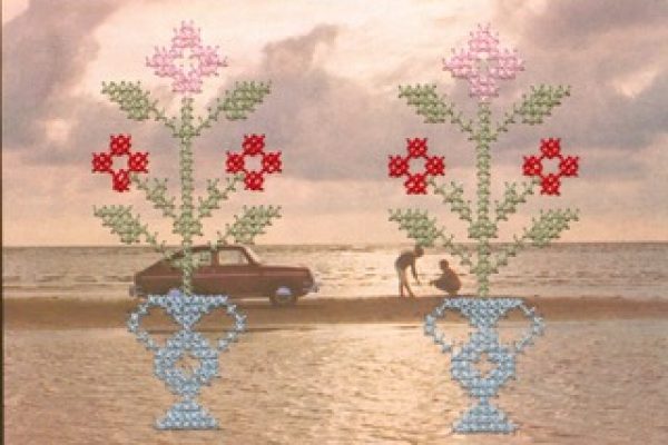 Textile embroidery over a photo of an old fashioned car and two people on a beach
